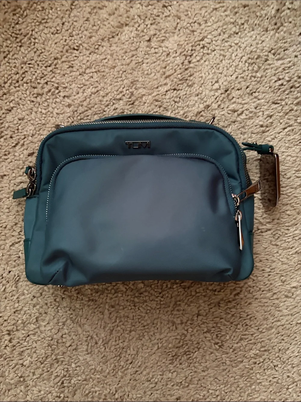 Tumi Teal Nylon Voyager  cross body with Front Zip Pocket bag